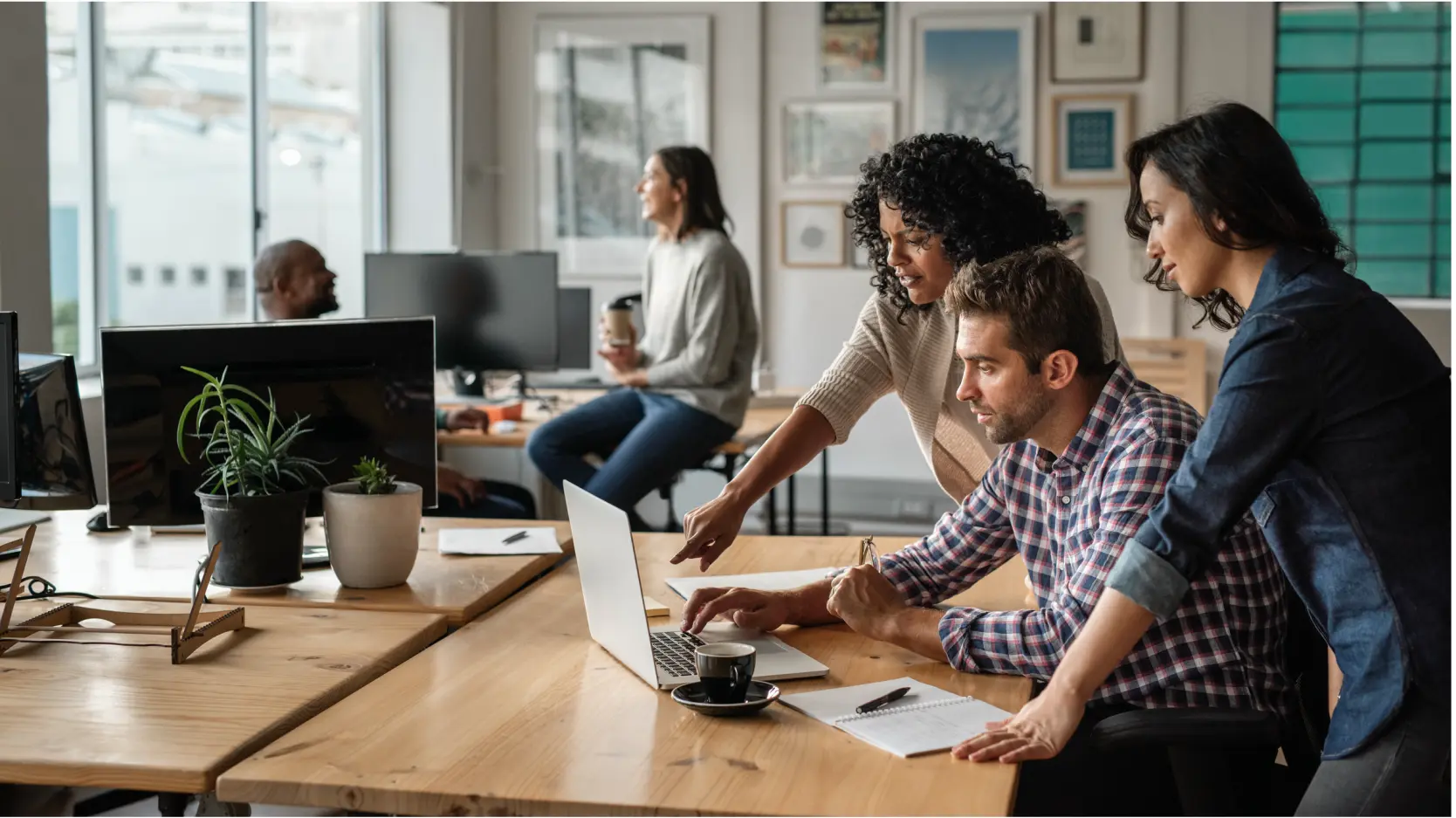 Payroll professional working in a team to run a clients payroll